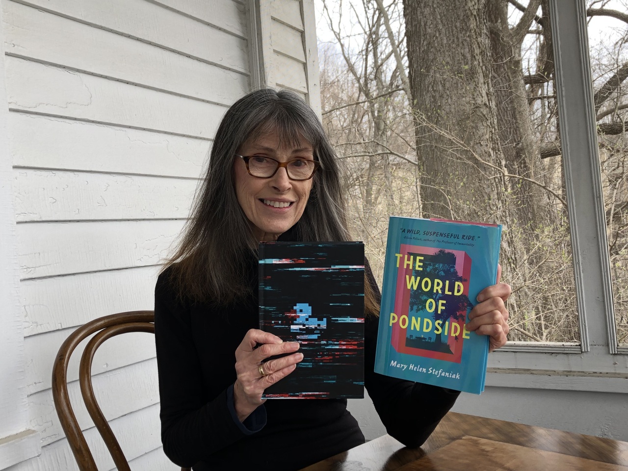 Underneath the stunning jacket of The World of Pondside, you'll find a surprise.  Once you settle in between the covers, you'll know what that duckling is all about--and why it's gone blue.