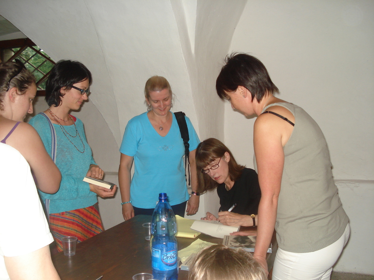 Signing books (The Turk and My Mother, Italian translation, Einaudi) after a talk at Palazzo Someda, Fiera di Primiero, Italy